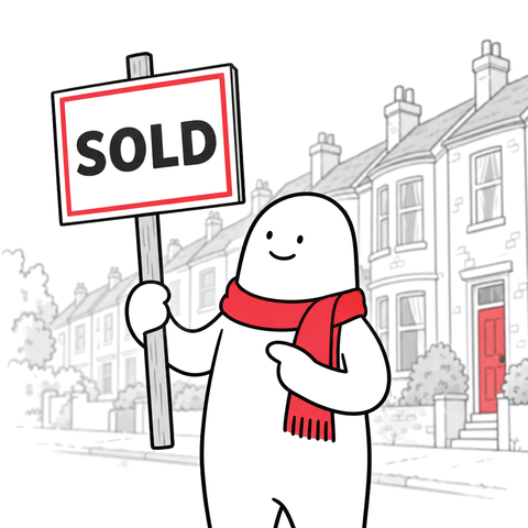 A Homie estate agent holding a SOLD board